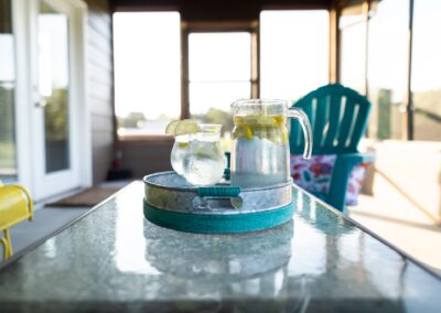 Cabin 1- Water's Edge patio image with lemonade